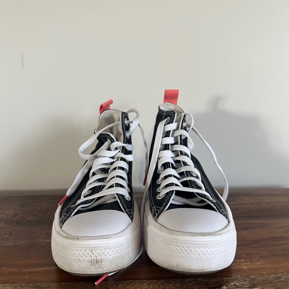Black and White High-Top Sneakers with Pink Accents